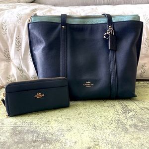 Navy coach purse and wallet set.